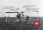 Image of failed ornithopter helicopter trying to fly Chicago Illinois USA, 1925, second 55 stock footage video 65675039280