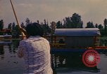 Image of Floating Gardens of Xochimilco Mexico City Mexico, 1975, second 8 stock footage video 65675039468