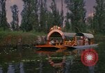 Image of Trajinera boats Mexico City Mexico, 1975, second 3 stock footage video 65675039469