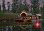 Image of Trajinera boats Mexico City Mexico, 1975, second 4 stock footage video 65675039469