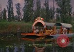 Image of Trajinera boats Mexico City Mexico, 1975, second 5 stock footage video 65675039469