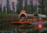 Image of Trajinera boats Mexico City Mexico, 1975, second 6 stock footage video 65675039469