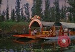 Image of Trajinera boats Mexico City Mexico, 1975, second 7 stock footage video 65675039469