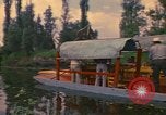 Image of Trajinera boats Mexico City Mexico, 1975, second 8 stock footage video 65675039469
