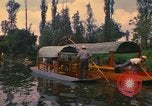 Image of Trajinera boats Mexico City Mexico, 1975, second 11 stock footage video 65675039469