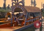 Image of Trajinera boats Mexico City Mexico, 1975, second 15 stock footage video 65675039469