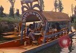 Image of Trajinera boats Mexico City Mexico, 1975, second 16 stock footage video 65675039469