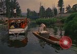 Image of Trajinera boats Mexico City Mexico, 1975, second 21 stock footage video 65675039469