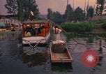 Image of Trajinera boats Mexico City Mexico, 1975, second 25 stock footage video 65675039469