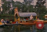 Image of Trajinera boats Mexico City Mexico, 1975, second 31 stock footage video 65675039469