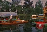 Image of Trajinera boats Mexico City Mexico, 1975, second 33 stock footage video 65675039469