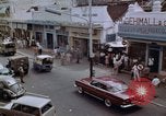 Immagine di La circolazione di Giacarta area dello shopping Jakarta Indonesia, 1964, secondo 4 filmato di repertorio 65675039494