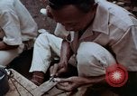 Immagine di Ring maker nel mercato di Giacarta Jakarta Indonesia, 1964, secondo 20 filmato di repertorio 65675039495