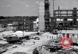 Image of Constructing a petroleum processing facility United States USA, 1943, second 1 stock footage video 65675039521