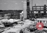 Image of Constructing a petroleum processing facility United States USA, 1943, second 3 stock footage video 65675039521