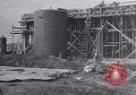 Image of Constructing a petroleum processing facility United States USA, 1943, second 5 stock footage video 65675039521