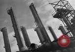 Image of Constructing a petroleum processing facility United States USA, 1943, second 11 stock footage video 65675039521