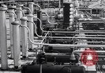 Image of Constructing a petroleum processing facility United States USA, 1943, second 36 stock footage video 65675039521