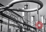 Image of Constructing a petroleum processing facility United States USA, 1943, second 56 stock footage video 65675039521