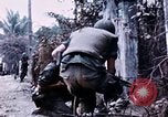 Image of American soldier Saigon Vietnam, 1968, second 3 stock footage video 65675039544