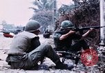 Image of American soldier Saigon Vietnam, 1968, second 15 stock footage video 65675039544