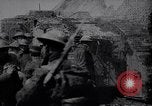 Image of British Mark IV tank with infantry in World War I Western Front, 1917, second 4 stock footage video 65675039556