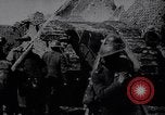 Image of British Mark IV tank with infantry in World War I Western Front, 1917, second 6 stock footage video 65675039556