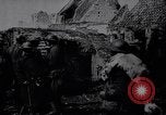 Image of British Mark IV tank with infantry in World War I Western Front, 1917, second 10 stock footage video 65675039556