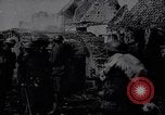 Image of British Mark IV tank with infantry in World War I Western Front, 1917, second 11 stock footage video 65675039556