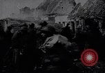 Image of British Mark IV tank with infantry in World War I Western Front, 1917, second 12 stock footage video 65675039556