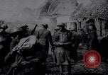 Image of British Mark IV tank with infantry in World War I Western Front, 1917, second 13 stock footage video 65675039556