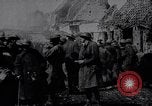 Image of British Mark IV tank with infantry in World War I Western Front, 1917, second 14 stock footage video 65675039556