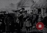 Image of British Mark IV tank with infantry in World War I Western Front, 1917, second 15 stock footage video 65675039556