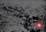 Image of British Mark IV tank with infantry in World War I Western Front, 1917, second 22 stock footage video 65675039556