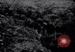 Image of British Mark IV tank with infantry in World War I Western Front, 1917, second 23 stock footage video 65675039556