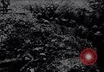 Image of British Mark IV tank with infantry in World War I Western Front, 1917, second 30 stock footage video 65675039556