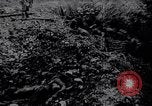 Image of British Mark IV tank with infantry in World War I Western Front, 1917, second 32 stock footage video 65675039556