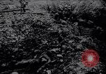 Image of British Mark IV tank with infantry in World War I Western Front, 1917, second 33 stock footage video 65675039556