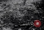 Image of British Mark IV tank with infantry in World War I Western Front, 1917, second 40 stock footage video 65675039556