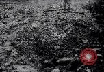 Image of British Mark IV tank with infantry in World War I Western Front, 1917, second 42 stock footage video 65675039556