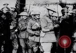 Image of British Mark IV tank with infantry in World War I Western Front, 1917, second 48 stock footage video 65675039556