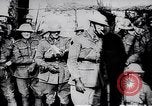 Image of British Mark IV tank with infantry in World War I Western Front, 1917, second 50 stock footage video 65675039556