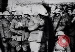 Image of British Mark IV tank with infantry in World War I Western Front, 1917, second 51 stock footage video 65675039556