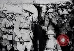 Image of British Mark IV tank with infantry in World War I Western Front, 1917, second 53 stock footage video 65675039556