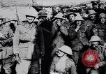 Image of British Mark IV tank with infantry in World War I Western Front, 1917, second 55 stock footage video 65675039556