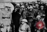 Image of British Mark IV tank with infantry in World War I Western Front, 1917, second 56 stock footage video 65675039556