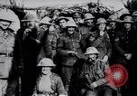 Image of British Mark IV tank with infantry in World War I Western Front, 1917, second 58 stock footage video 65675039556