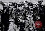 Image of British Mark IV tank with infantry in World War I Western Front, 1917, second 59 stock footage video 65675039556