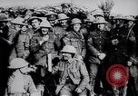 Image of British Mark IV tank with infantry in World War I Western Front, 1917, second 61 stock footage video 65675039556