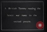 Image of British soldier reads news to civilians Europe, 1918, second 3 stock footage video 65675039557